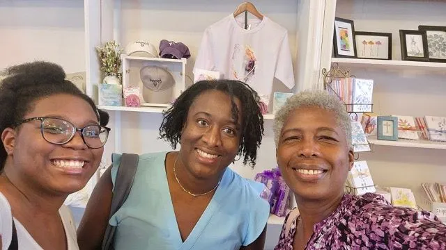 Lisa Colisa and a friend at a shop